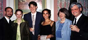 Lutzeler and his wife, Ingrid, relax at home with their daughter, Andrea (second from left; with her friend, Josh), and son, Thilo (third from left; with his friend, Saaba).