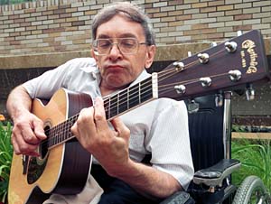 Scott Robinson plays a custom-built Martin guitar. 