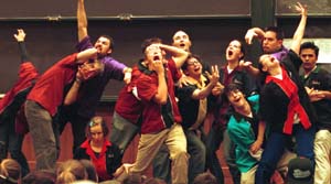 The nine current members of Mama's Pot Roast hammed it up with 19 returning alumni during the comedy group's 10th-anniversary performance Nov. 7 in Brown Hall Auditorium.