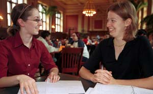 Rhodes Scholars Allison Gilmore (left) and Bethany Ehlmann chat in Holmes Lounge. Ehlmann is a double major in earth and planetary sciences and environmental studies, both in Arts & Sciences. Gilmore is studying for joint bachelor's and master's degrees in mathematics in Arts & Sciences.