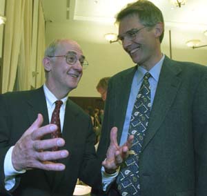 Philip D. Stahl, Ph.D. (left), shares a laugh with Jonathan S. Turner, Ph.D., at the Chancellor's Gala April 17 at the Charles F. Knight Executive Education Center. At the event, Chancellor Mark S. Wrighton announced Stahl as the winner of the Carl and Gerty Cori Faculty Achievement Award, and Turner as recipient of the Arthur Holly Compton Faculty Achievement Award. The awards will be conferred this fall.