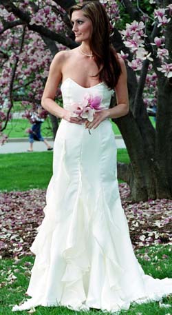 A bridal gown with silk, satin and charmence and organza cascades, designed by School of Art fashion design seniro Kristen Fammartino. On May 2, the School of Art will present