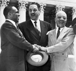 Justices Thurgood Marshall and Earl Warren celebrating the historic Brown v. Board of Education Supreme Court decision.