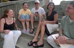 (From left) Stephanie Hales talks with friends from Uncle Joe's Peer Counseling and Resource Center: students Laurie Faiveley, Justin Lerner and Anjali Fulambarker, and psychology resident in Student Health and Counseling Services Craig Woodsmall, Psy.D.