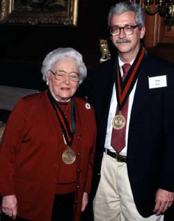 Edith L. Wolff and Timothy J. Ley, M.D., pause at Ley's installation as the Alan A. and Edith L. Wolff Professor in Medicine — one of a record 165 new professorships endowed during the campaign.