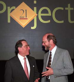 Campaign chairs Sam Fox (left) and John F. McDonnell share a lighter moment during the retreat. 