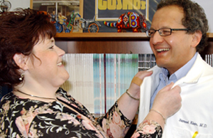 Weight management director Beth Henk enjoys a laugh with Samuel Klein, M.D. Henk says she's impressed with how well Klein relates to obesity issues. 