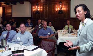Allie Chang Ray, executive director of the Court Appointed Special Advocates of St. Louis County, addresses those gathered Aug. 31 at Whittemore House for a breakfast kicking off the University's United Way fund-raising campaign. 