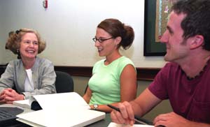 Rebecca S. Dresser, J.D. (left), meets with law students Carla Escobar and Mike Heaney to discuss ethical issues in medicine.