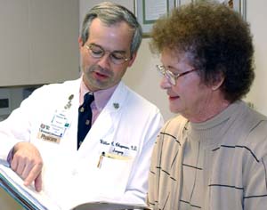 William C. Chapman, M.D., talks with patient Thelma Stevens during a follow-up exam after liver transplant surgery. Jeffery S. Crippin, M.D., medical director of liver transplantation and associate professor of medicine, says of Chapman, 