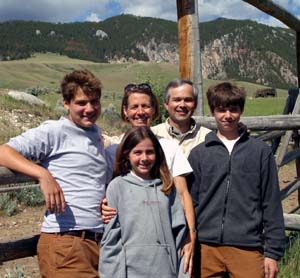 All three of Chapman's children inherited his love for horses. Here his family enjoys a recent trip to a Wyoming ranch.