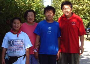 You with his family before a bike ride on the Katy Trial: (from left) daughter, Helen; wife, Yian; and son, Michael.