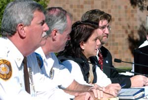 (l-r) Jerry Lee, chief of police for St. Louis County; Don Strom, chief of University police; Joani Komlos, media director for the Commission on Presidential Debates; and Steve Givens, chair of the University's Presidential Debate Steering Committee and assistant to the chancellor.