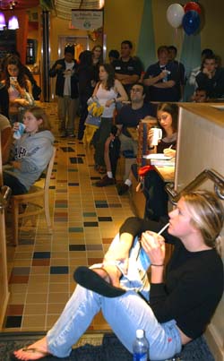 A crowd of students jams Ursa's Cafe in Gregg House to watch the debate. For those who didn't make it into the Athletic Complex, eight remote-viewing sites around the University were offered.