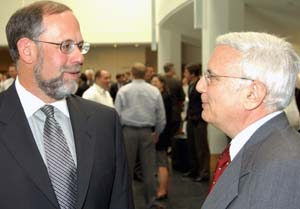 Blue Cross Blue Shield Association Chief Executive Officer Scott Serota (left) and Health Administration Program Director Stuart B. Boxerman discuss health-care issues at the first Bradley Executive Lecture Series.