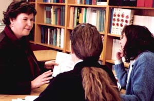 Ingrid B. Borecki, Ph.D. (left), associate professor of biostatistics and of genetics, studies how variations in genes may affect weight gain. 