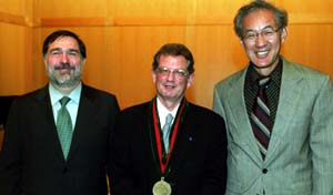 Yoram Rudy, Ph.D. (center), professor of biomedical engineering in the School of Engineering & Applied Science, was installed as the inaugural Fred Saigh Distinguished Professor of Engineering in a recent ceremony in Uncas A. Whitaker Hall for Biomedical Engineering. Among those attending the installation were Christopher I. Byrnes, Ph.D. (left), dean of the School of Engineering & Applied Science and the Edward H. and Florence G. Skinner Professor of Systems Science and Mathematics; and Frank C.P. Yin, Ph.D., M.D., the Stephen F. and Camilla T. Brauer Professor and chair of biomedical engineering.