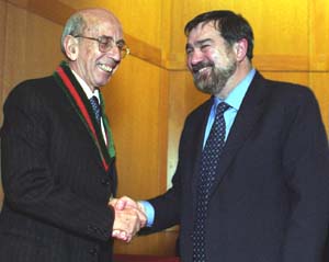 Christopher I. Byrnes, Ph.D. (right), dean of the School of Engineering & Applied Science and the Edward H. and Florence G. Skinner Professor of Systems Science and Mathematics, congratulates Alberto Isidori, Ph.D., at his installation as the first Edwin H. Murty Professor of Engineering. The professorship was made possible by a $1.5 million gift from the estate of Edwin H. Murty.