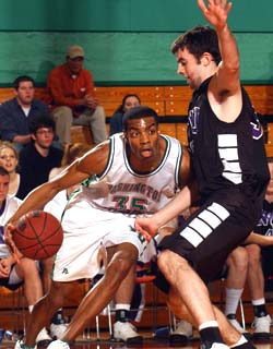 Bears senior Anthony Hollins drives to the hoop in a recent game against New York University. Hollins is shooting a team-best .571 from the floor and has grabbed a team-high 110 rebounds in helping the Bears to a 13-7 record with five games remaining in the regular season.