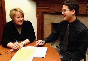 Director of Undergraduate Admissions Nanette Tarbouni and Steve Frappier, associate director of admissions, go over some details regarding April Welcome festivities.
