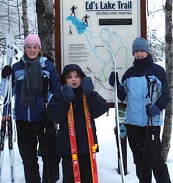 Whelan enjoys photography and cross-country skiing. Here she captures some of her faorite subjects — her children (from left) Julia, Eric and Alyssa — near their family cabin in northern Wisconsin.