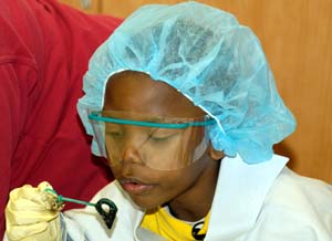 B.J. Cokley has a blast blowing bubbles as part of the group painting process. 