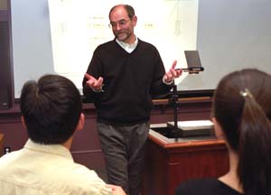 Ron King, the Myron Northrop Professor of Accounting in the Olin School of Business, takes a break from heavy-metal music to conduct one of his classes.