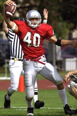 John Woock celebrates another big play for the Bears. In 2004, Woock — who will pursue a doctorate in biomedical engineering at Duke University in the fall — was named both an NCAA College Football National Scholar-Athlete and an *ESPN The Magazine* First-Team Academic All-American.