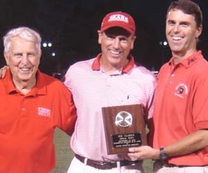 Head men's soccer coach Joe Clarke (center) notched his 300th career win when the Bears beat Illinois Wesleyan 4-0 Sept. 20. Pictured with Clark are assistant coach Val Pelizzaro (left) and Assistant Athletic Director Joe Worlund.