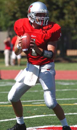 Bears junior quarterback Nick Henry drops back to pass in action earlier this season. Going into the Homecoming showdown with University Athletic Association rival University of Chicago (noon Oct. 8, Francis Field), Henry has completed 51 passes for 642 yards and three touchdowns.