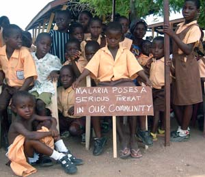 Parade of schoolchildren celebrating Africa Malaria Day (celebrated annually and promoted actively by the Roll Back Malaria Partnership).