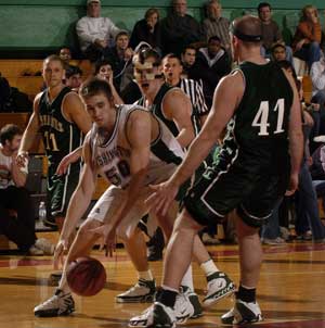 WUSTL sophomore Troy Ruths earned the Robert L. Burnes Most Valuable Player Award at the 22nd Annual Lopata Classic. He followed up an 18-point, seven-steal performance in the Bears' opener with a 25-point effort in the championship game (above).