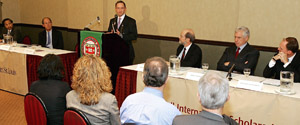 Mark. S. Wrighton, chancellor of Washington University in St. Louis, announces the formation of the McDonnell International Scholars Academy at a news conference Oct. 19, 2005, at the Overseas Press Club in New York City. Looking on from the dais are (from left) Santanu Das, Ph.D., member of the Washington University in St. Louis Board of Trustees and president, chief executive officer and chairman of the board of TranSwitch Corp.; David W. Kemper, chairman, president and chief executive officer of Commerce Bank Shares and chairman of the Washington University in St. Louis Board of Trustees; John F. McDonnell, vice chairman of the Washington University in St. Louis Board of Trustees and retired chairman of the board of the McDonnell Douglas Corp.; John C. Danforth, chair of the McDonnell International Scholars Academy External Advisory Committee, former U.S. ambassador to the United Nations and three-term U.S. senator; and Donald B. McNaughton, senior vice president of international and strategic Ventures for Corning Inc.