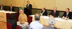 Mark. S. Wrighton, chancellor of Washington University in St. Louis, announces the formation of the McDonnell International Scholars Academy at a news conference Oct. 19, 2005, at the Overseas Press Club in New York City. Looking on from the dais are (from left) Santanu Das, Ph.D., member of the Washington University in St. Louis Board of Trustees and president, chief executive officer and chairman of the board of TranSwitch Corp.; David W. Kemper, chairman, president and chief executive officer of Commerce Bank Shares and chairman of the Washington University in St. Louis Board of Trustees; John F. McDonnell, vice chairman of the Washington University in St. Louis Board of Trustees and retired chairman of the board of the McDonnell Douglas Corp.; John C. Danforth, chair of the McDonnell International Scholars Academy External Advisory Committee, former U.S. ambassador to the United Nations and three-term U.S. senator; and Donald B. McNaughton, senior vice president of international and strategic Ventures for Corning Inc.