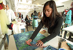 Rachel Lwin, a senior fashion major in the Sam Fox School of Design & Visual Arts, prepares for the 2006 Fashion Design Show, which will be May 7 at the Saint Louis Galleria. All clothing for the show is selected by a jury of University faculty and local design professionals.