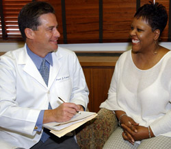 Patrick Lustman meets with a patient.