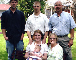 Jim Severine and his family: (left to right) sons Nathan and Nick; Nick's wife, Amanda, and their daughter, Peyton (6 months old); and Severine's wife, Sheree.