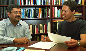 Damien Brewer (right) worked in the lab of Pratim Biswas, Ph.D., the Stifel and Quinette Jens Professor of Environmental Engineering Science and director of the Environmental Engineering Science Program. Their collaboration led to a presentation at the 2005 annual meeting of the American Institute of Chemical Engineers in Cincinnati.
