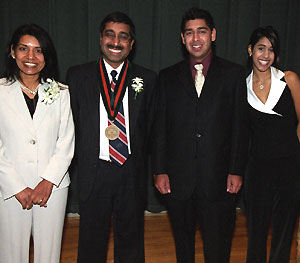 Gupta's family joins him at his fall 2005 installation as the Geraldine J. and Robert L. Virgil Professor of Accounting and Management: (from left) wife, Sunita; son, Vivek; and daughter, Sumi.