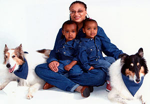 From left: Duste the dog, Ethan, Dione Farria, Eva, and Gypsy the dog.