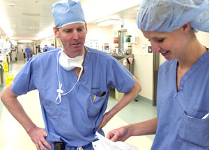 Chris Eagon talks with Alison Snyder-Warwick, a surgery resident, about a bariatric case. This month, Washington University's bariatric surgery program was named a Center of Excellence by the American Society for Bariatric Surgery. This designation signifies that the program meets or exceeds national standards for safety and patient outcomes.