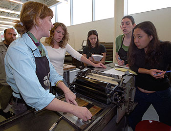 Jana Harper, lecturer in book arts in the Sam Fox School of Design & Visual Arts, leads a course in the Nancy Spirtas Kranzberg Studio for the Illustrated Book. The studio, formerly located at West Campus, recently moved into the school's new Earl E. and Myrtle E. Walker Hall, a studio facility designed by Pritzker Prize-winning architect Fumihiko Maki.