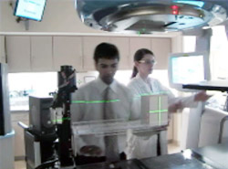 Parag Parikh and Kristen Lechleiter set up the 4D Phantom developed at Washington University School of Medicine to simulate the motion of tumors in the lung.