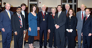 Present at the installation of James T. Little, Ph.D., as the first Donald Danforth, Jr. Distinguished Professor in Business are (from left) David Hollo, Donald Danforth Jr.'s son-in-law; Mahendra R. Gupta, Ph.D.; Christopher Danforth, Donald Danforth Jr.'s son; Elizabeth Little, Little's daughter; Little; Carolyn Danforth, Donald Danforth Jr.'s wife; Donald Danforth III, Donald Danforth Jr.'s son; John