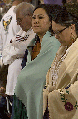 Melissa Clyde (center) honors her Navajo heritage at the 17th annual Pow Wow April 14 in the Athletic Complex. Her deep-rooted sense of pride in her people led her to the social work field, through which she will help Native American children.