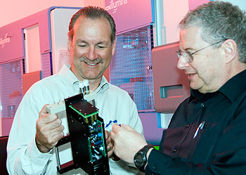 Richard K. Wilson, Ph.D. (left), and George Weinstock, Ph.D., professor of genetics, in the Genome Sequencing Center (GSC).