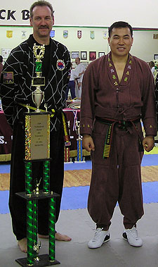 Richard K. Wilson (left) with Grandmaster Y.S. Rho, Wilson's Tae Kwan Do instructor. Wilson recently tested for and received his fifth-degree black belt.