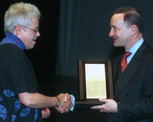 Georgia Binnington receives the Gloria White award from Wrighton