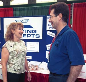 Rohn Beardsley discusses his products and services with Judy O'Leary