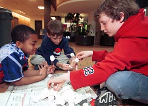 Tommy, August and Charlie work on marshmallow structures